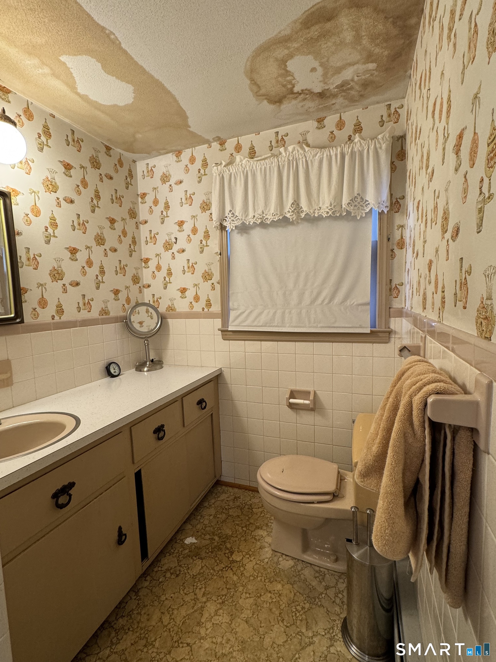 404 Woodland Street Windsor Locks, CT 06096 - Photo 7 of 8 a bathroom with a granite countertop sink toilet and shower