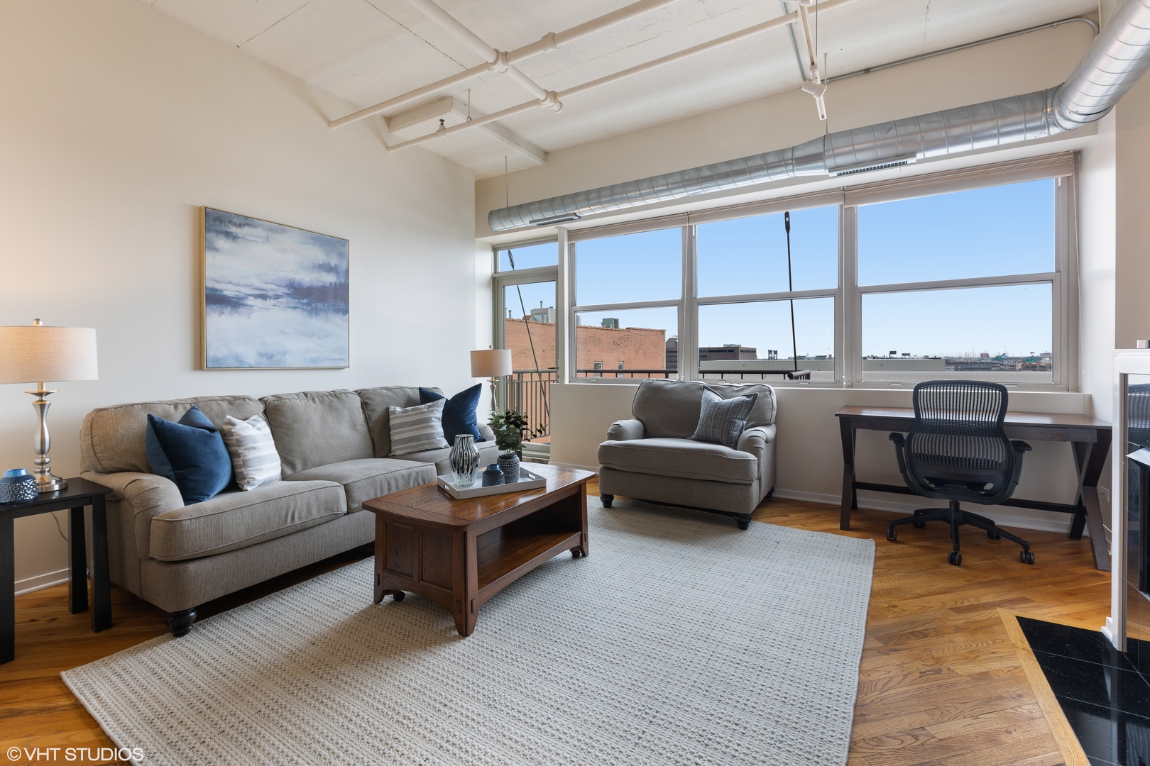 500 South Clinton Street, Unit 722 Chicago, IL 60607 - Photo 3 of 21 a living room with furniture and a large window