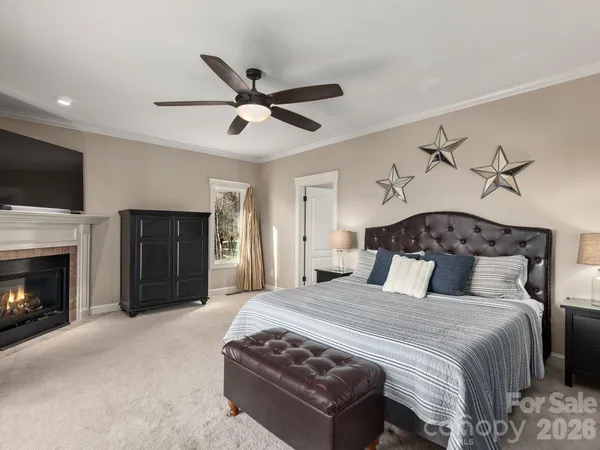 a kitchen with a stove a chair and a stove top oven