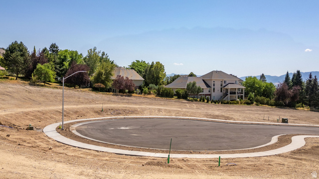 1473 Red Fox Court, Unit 4 Logan, UT 84321 - Photo 14 of 19 New construction lot featuring a paved cul-de-sac and concrete sidewalk