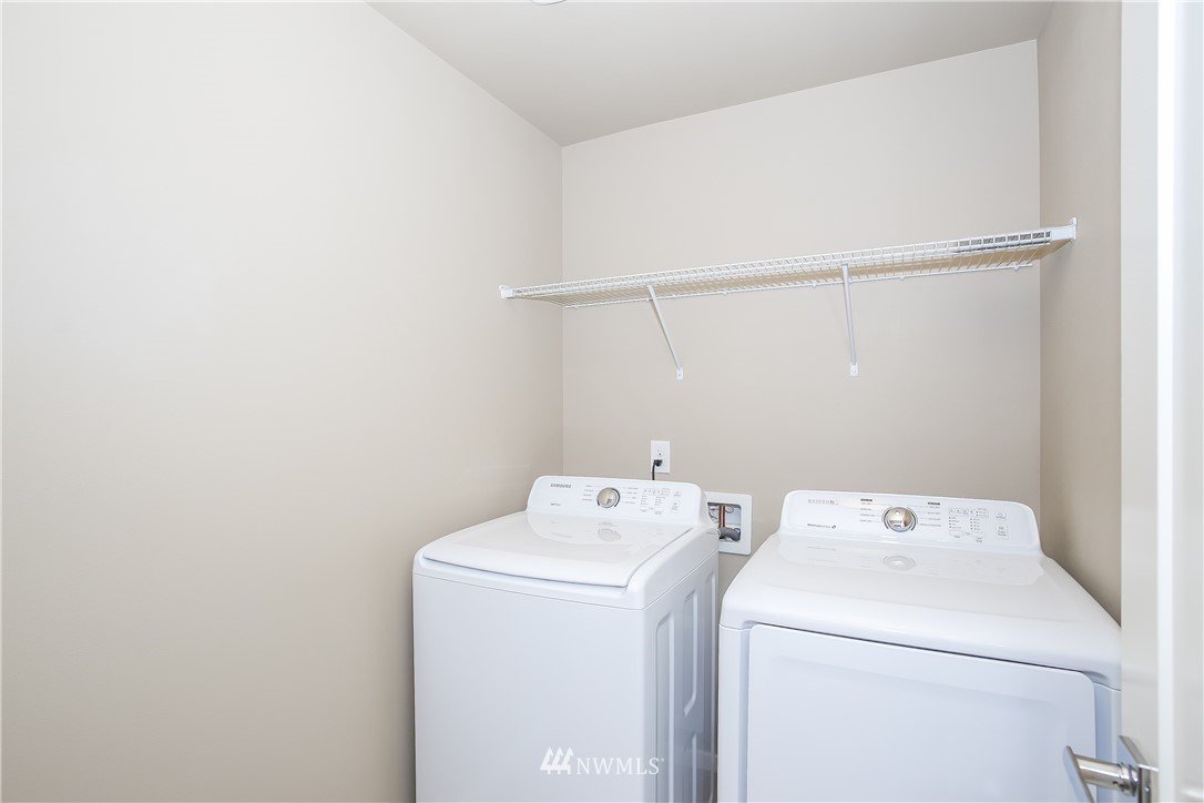 4108 168th Place Southeast Bothell, WA 98012 - Photo 29 of 39 a utility room with dryer and washer