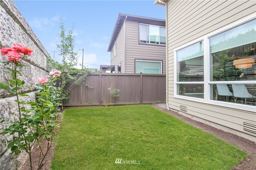4108 168th Place Southeast Bothell, WA 98012 - Photo 34 of 39 a view of a backyard with a garden