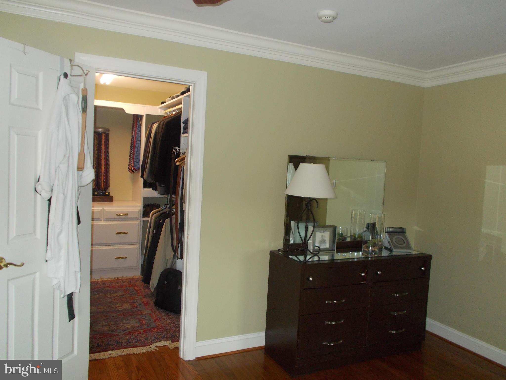 15712 Spade Road Hagerstown, MD 21740 - Photo 13 of 30 a view of a cabinet and mirror in a room