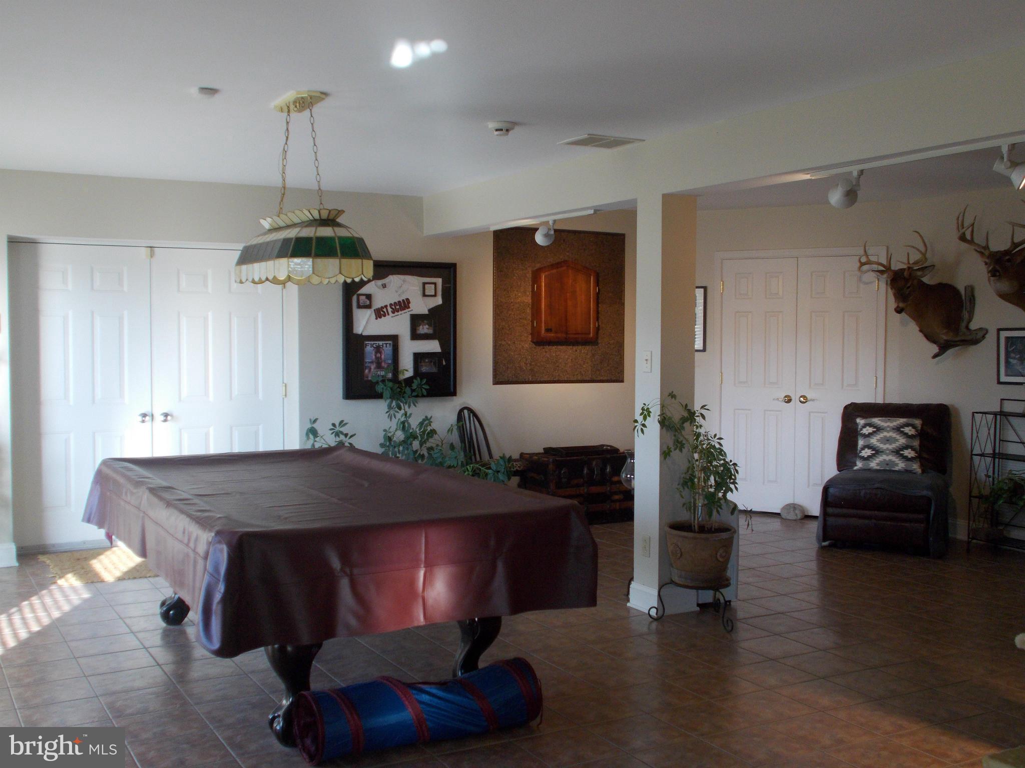 15712 Spade Road Hagerstown, MD 21740 - Photo 18 of 30 a kitchen with a table and chairs in it