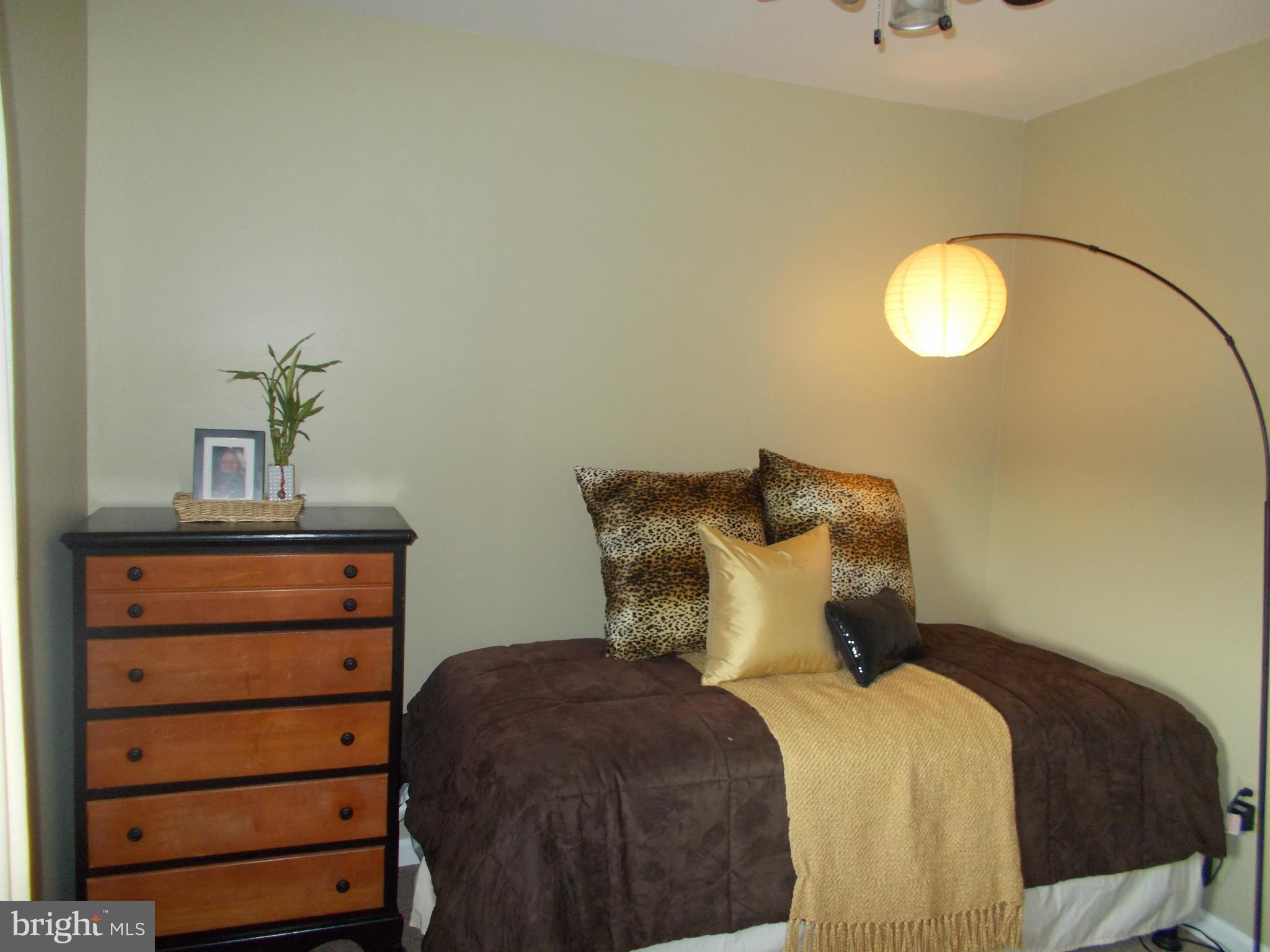 15712 Spade Road Hagerstown, MD 21740 - Photo 20 of 30 a bedroom with a bed and a dresser