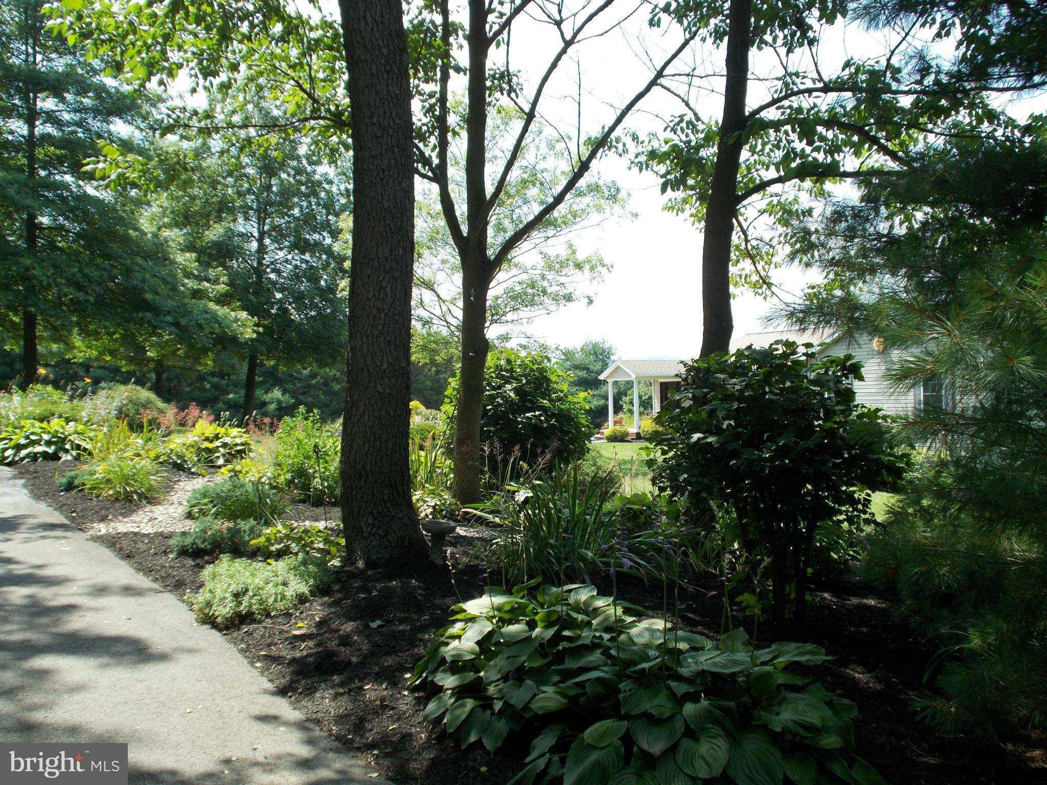 15712 Spade Road Hagerstown, MD 21740 - Photo 26 of 30 a view of a tree in a garden