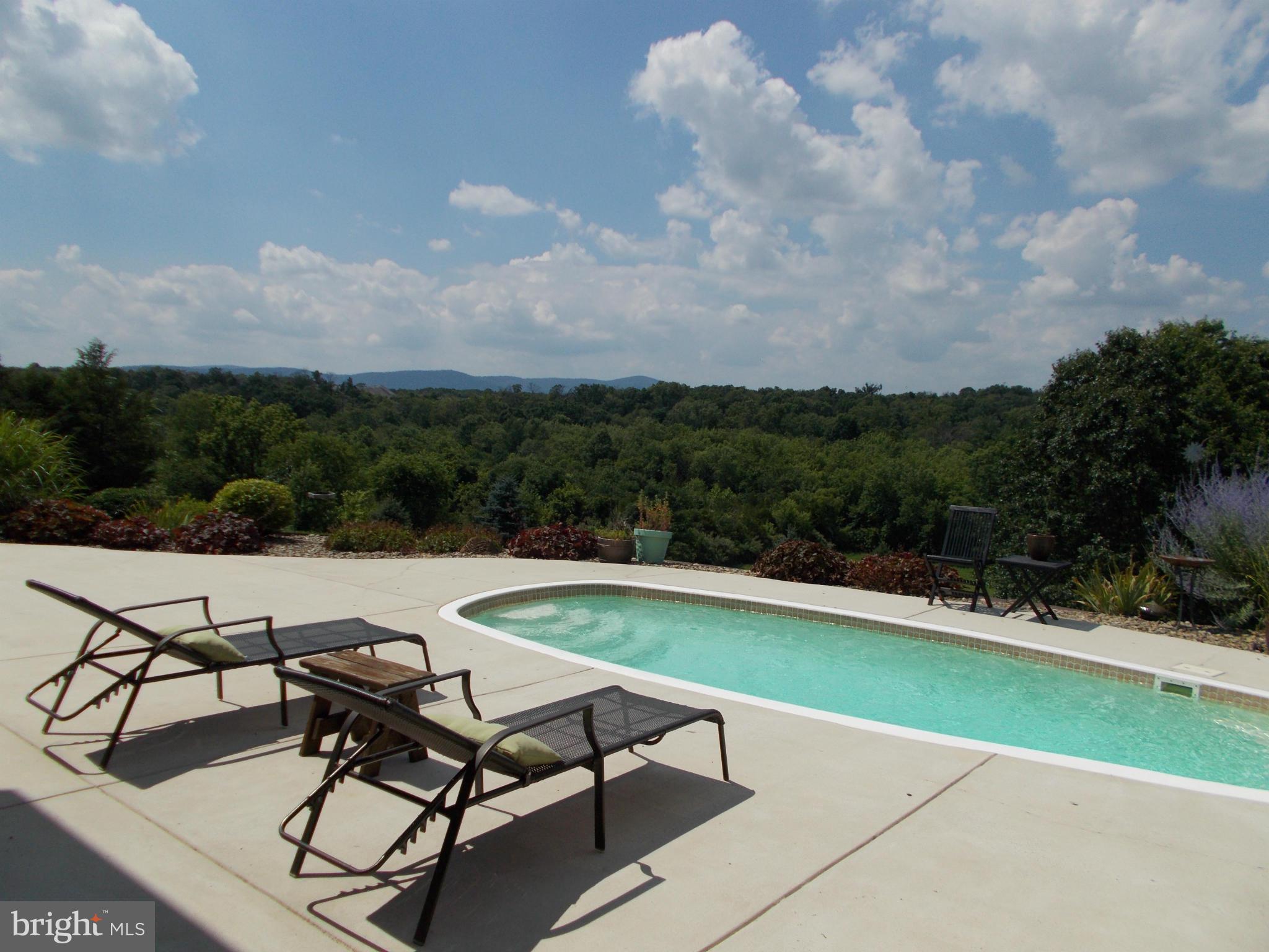 15712 Spade Road Hagerstown, MD 21740 - Photo 5 of 30 a view of a terrace with sitting area