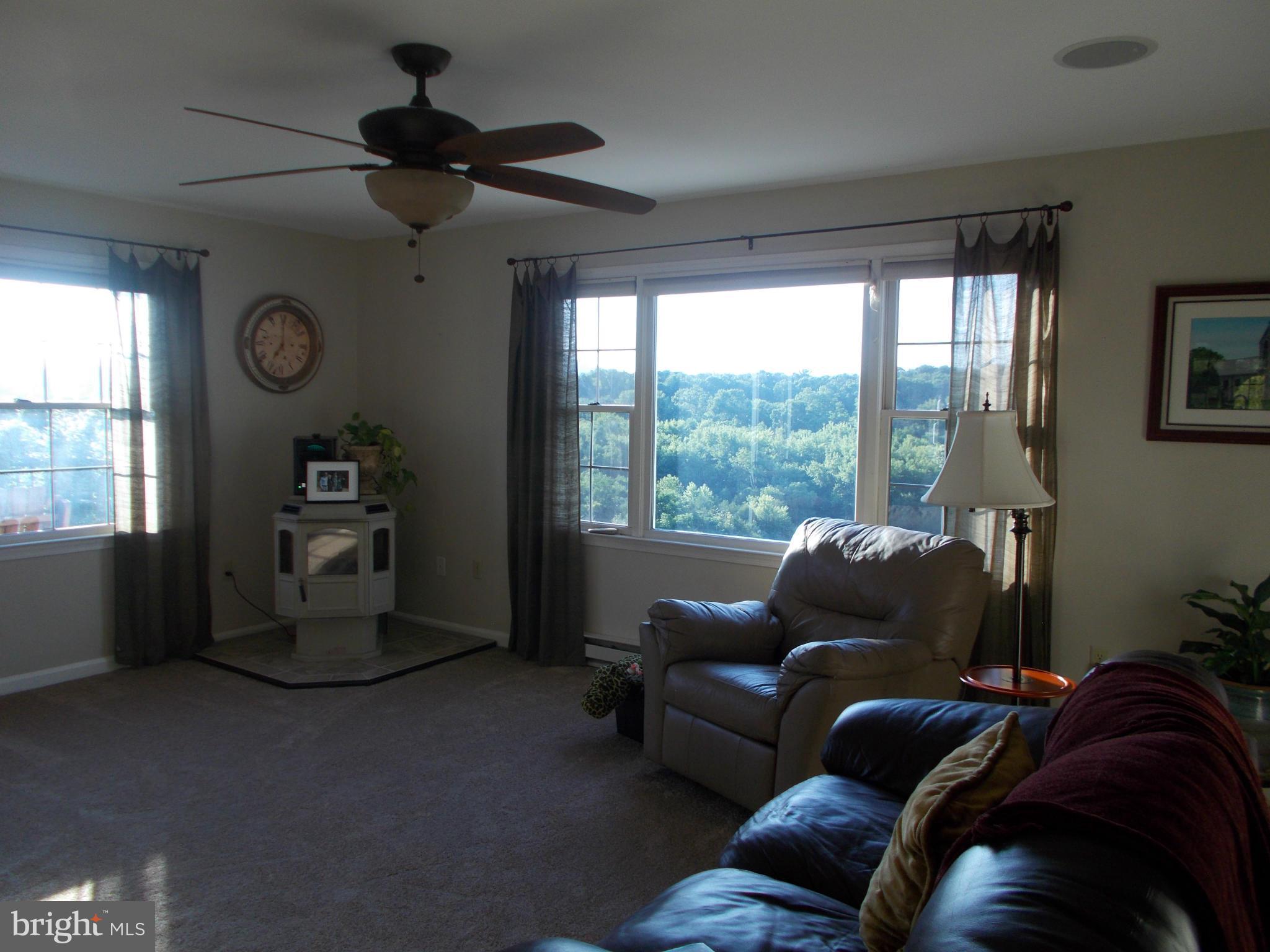 15712 Spade Road Hagerstown, MD 21740 - Photo 9 of 30 a living room with furniture and a window