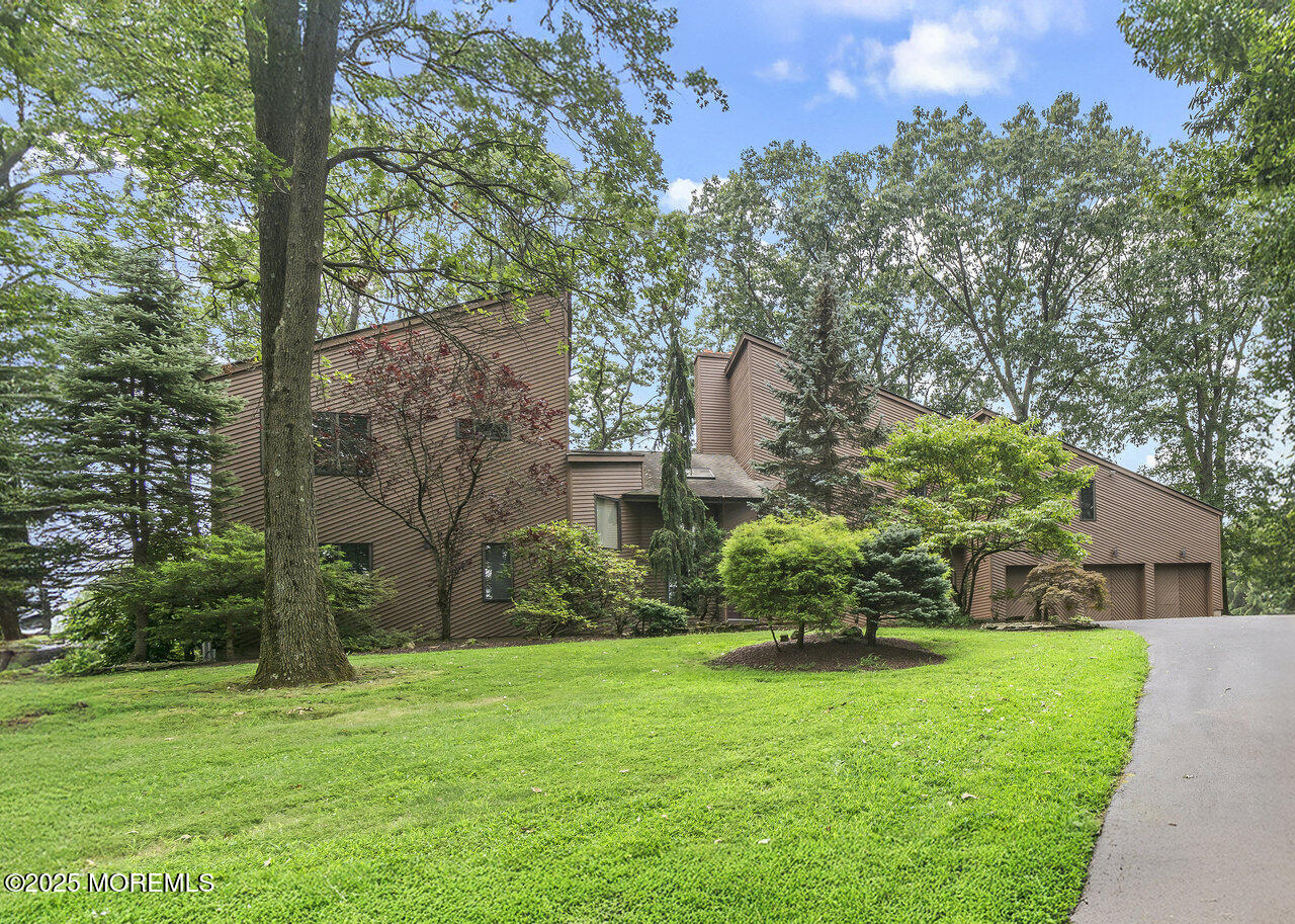 31 Thompson Grove Road Freehold, NJ 07728 - Photo 1 of 54 a view of a house with a yard