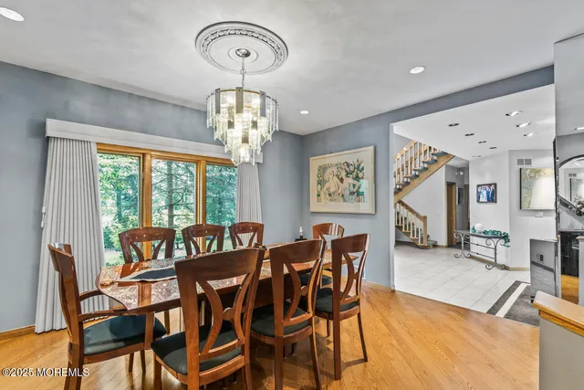 a bedroom with a bed window and couch