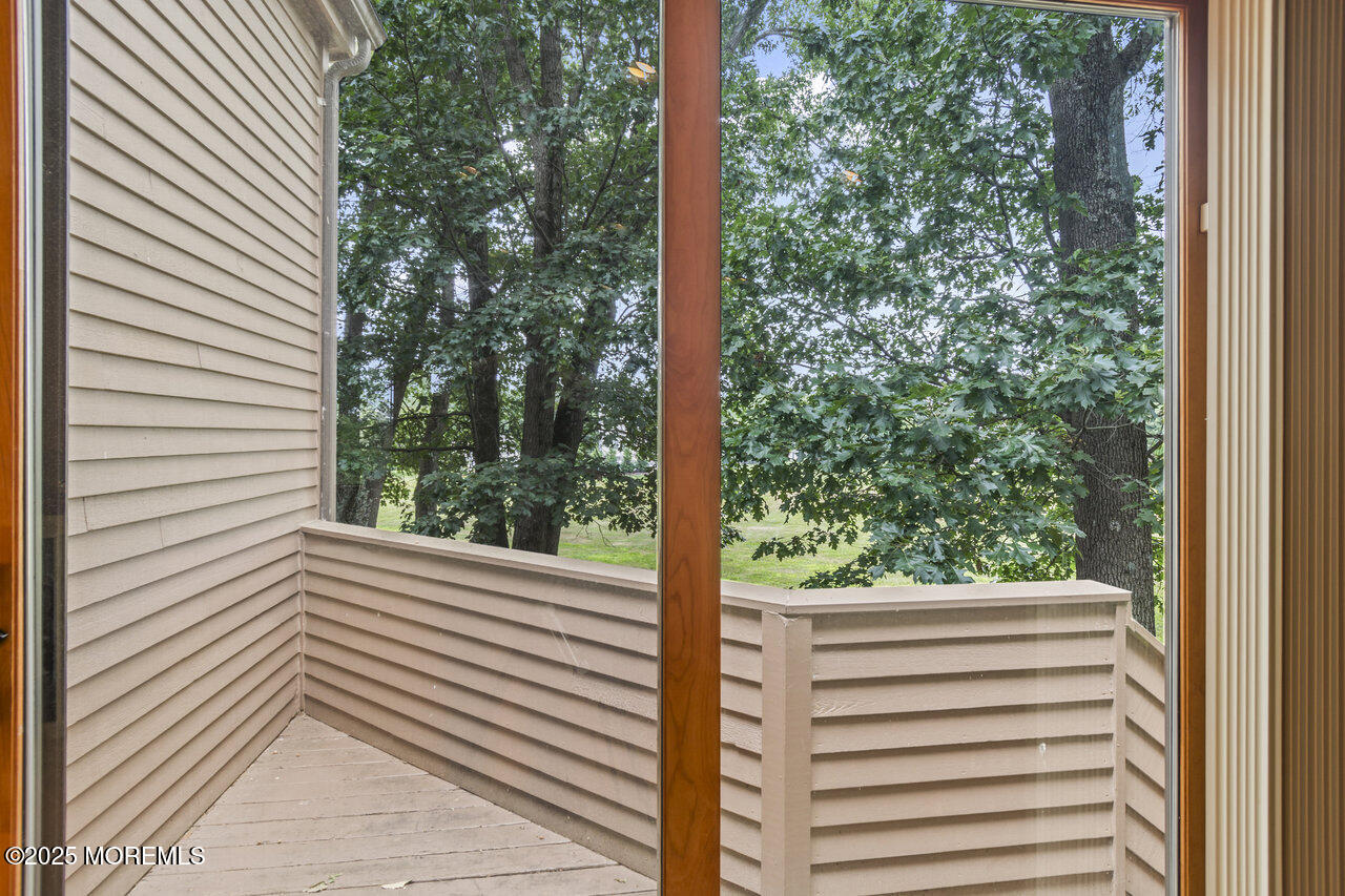 31 Thompson Grove Road Freehold, NJ 07728 - Photo 41 of 54 a view of a building from a window