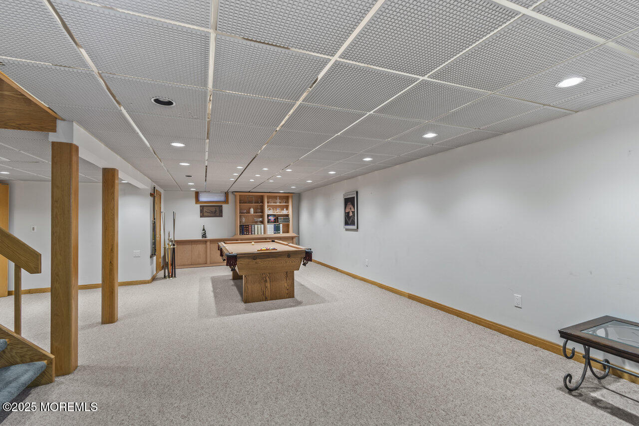 31 Thompson Grove Road Freehold, NJ 07728 - Photo 47 of 54 a big room with chandelier fan and furniture