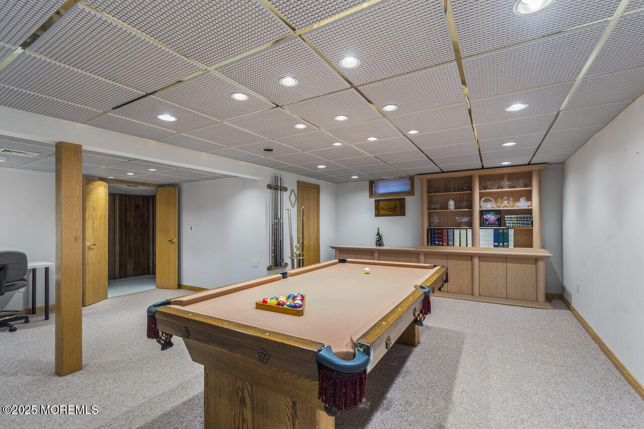 31 Thompson Grove Road Freehold, NJ 07728 - Photo 48 of 54 a room with pool table and windows