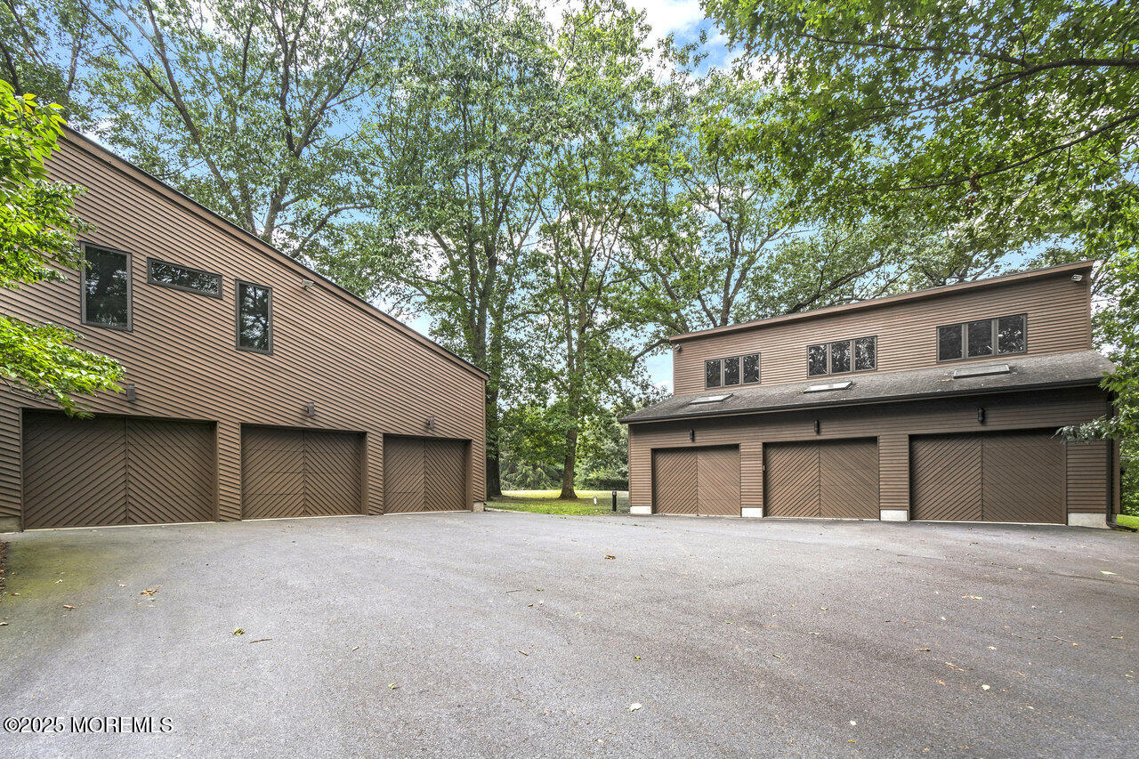 31 Thompson Grove Road Freehold, NJ 07728 - Photo 6 of 54 a house view with a outdoor space