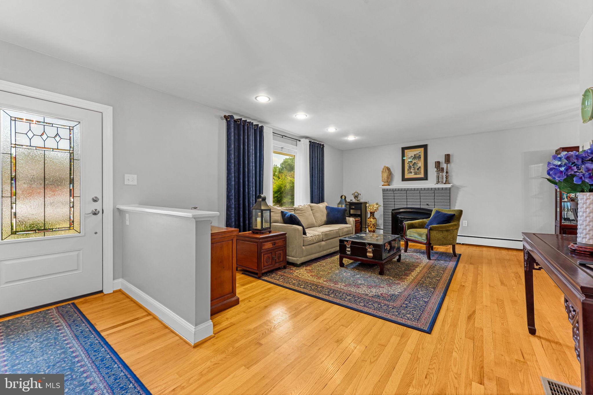 2902 Ritchie Avenue Baltimore, MD 21219 - Photo 6 of 43 a living room with furniture and a table