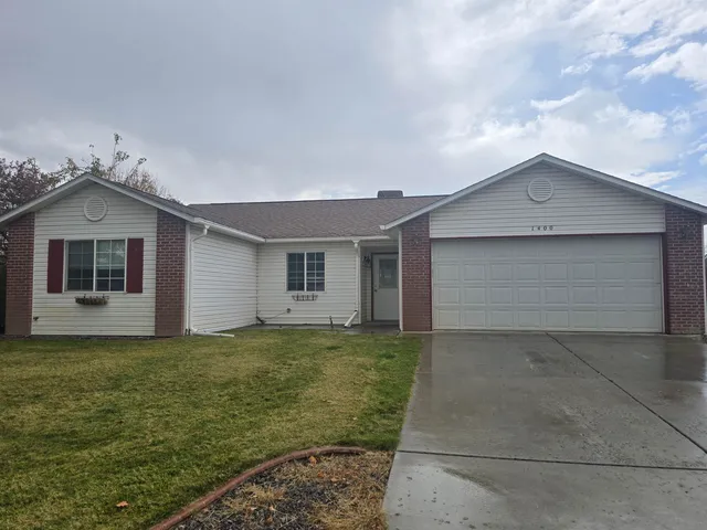 a house view with a garden space