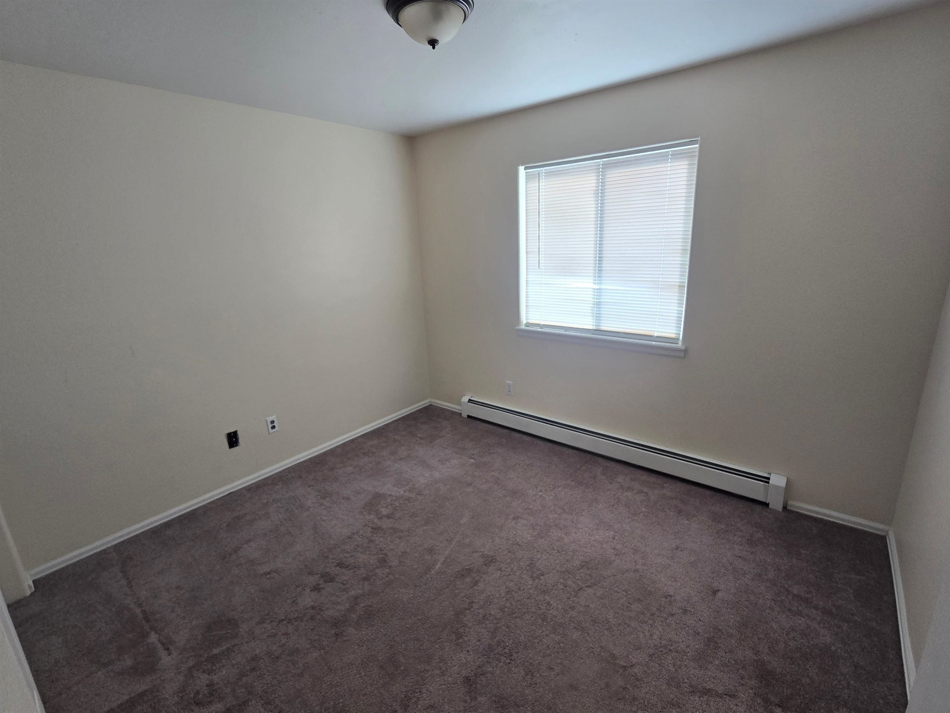 1400 Powell Street Fruita, CO 81521 - Photo 15 of 21 an empty room with a window