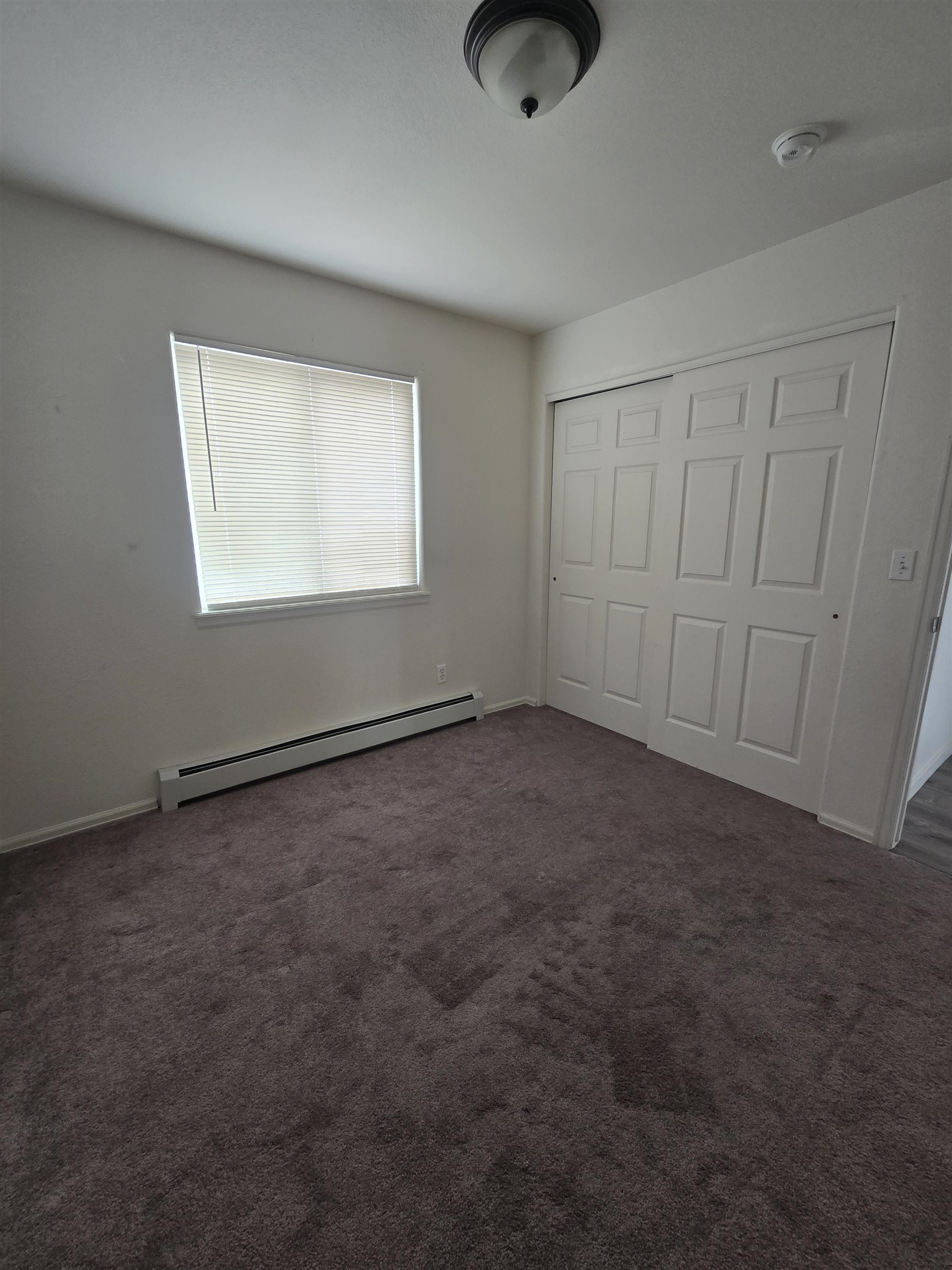1400 Powell Street Fruita, CO 81521 - Photo 16 of 21 an empty room with a empty space and windows