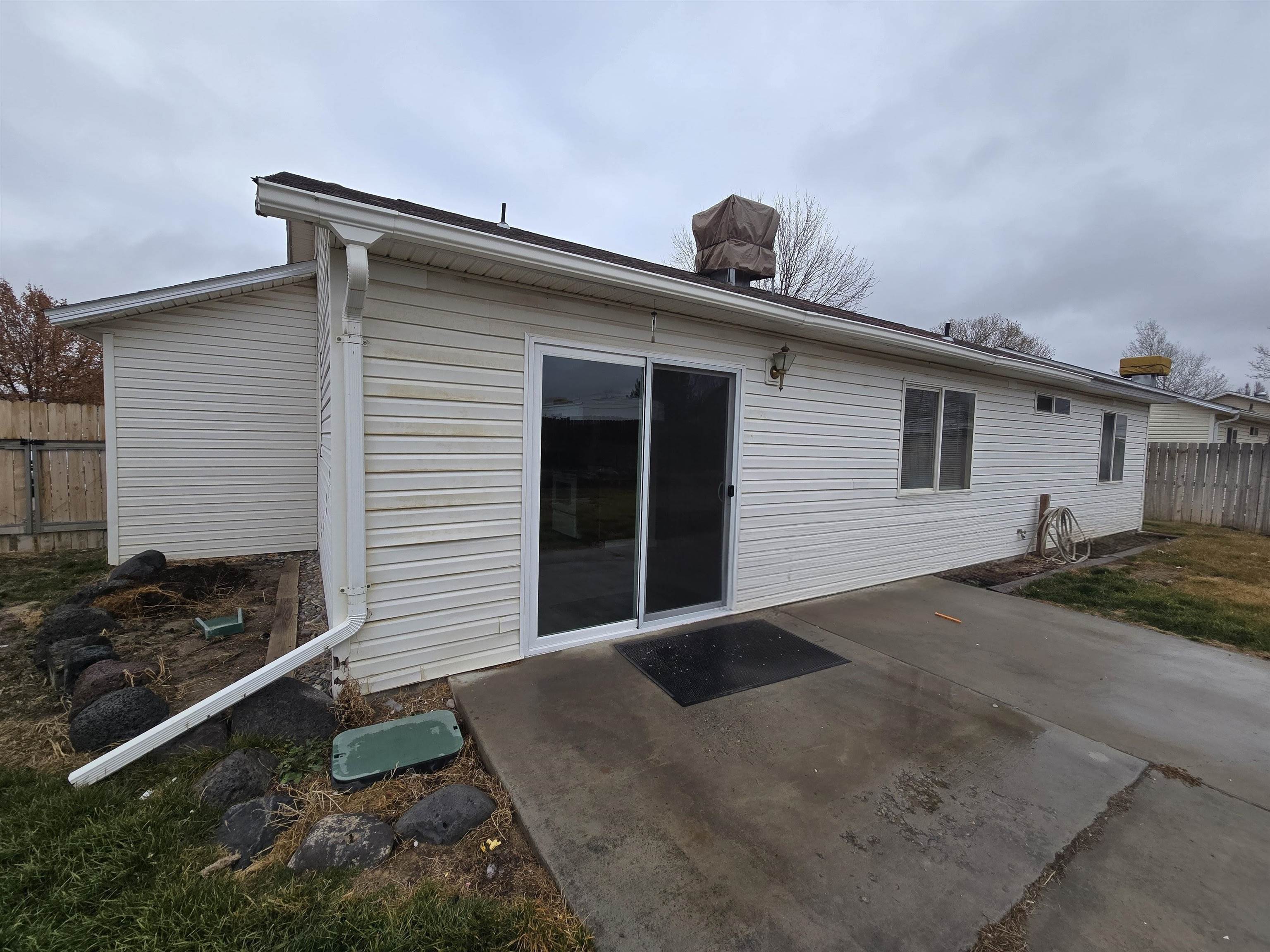 1400 Powell Street Fruita, CO 81521 - Photo 18 of 21 a front view of a house with a yard