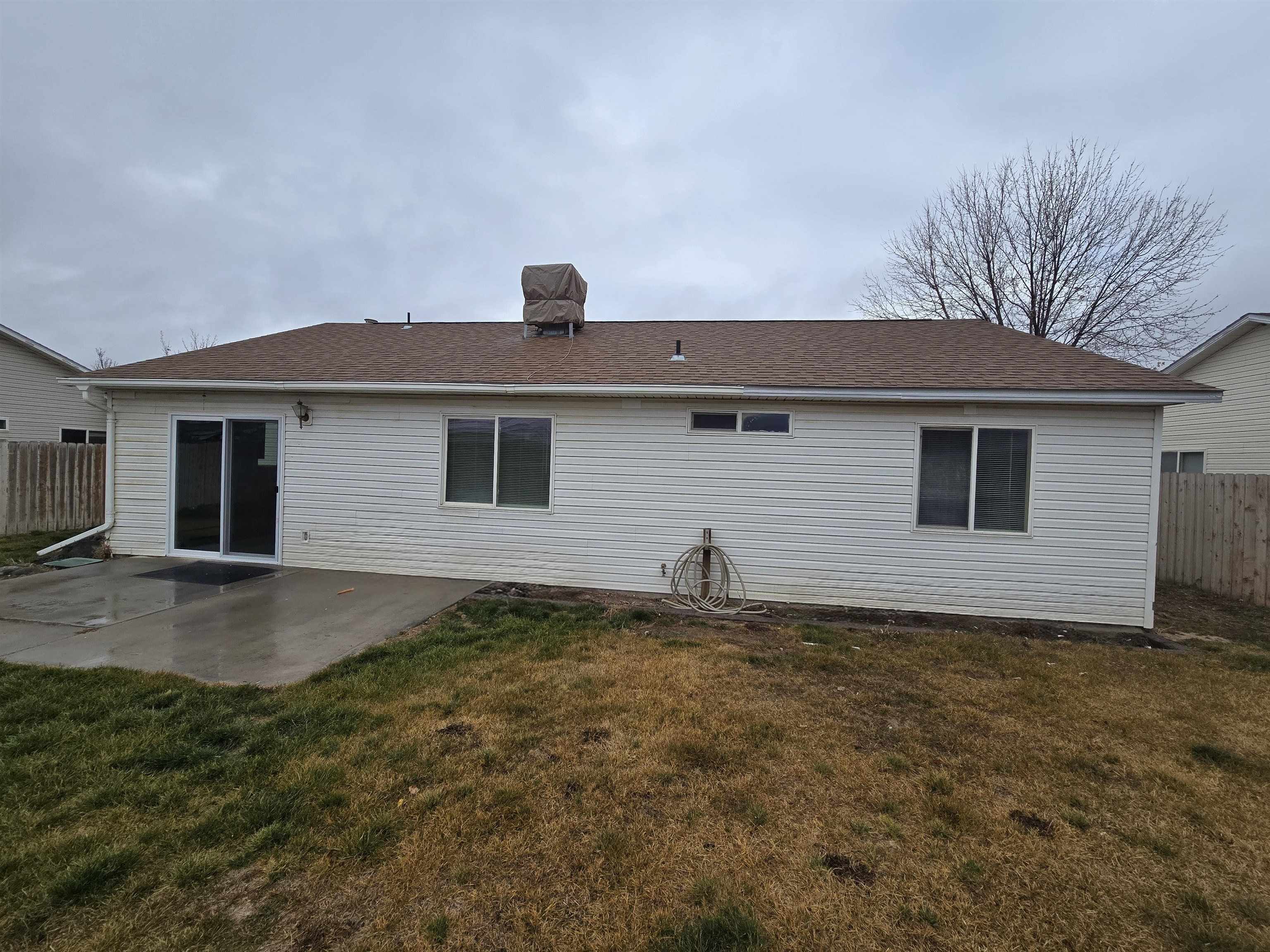 1400 Powell Street Fruita, CO 81521 - Photo 19 of 21 a front view of a house with yard