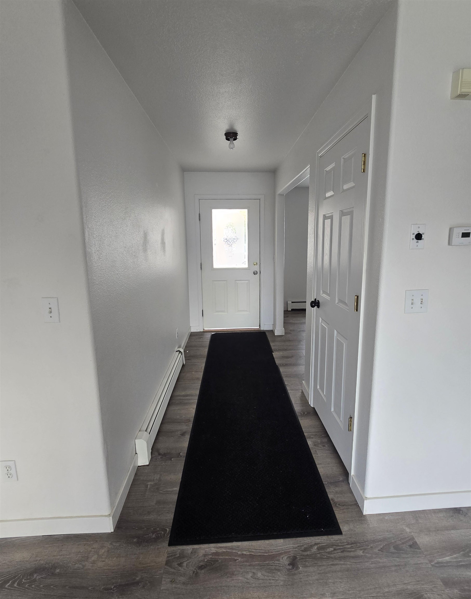 1400 Powell Street Fruita, CO 81521 - Photo 8 of 21 wooden floor in an empty room