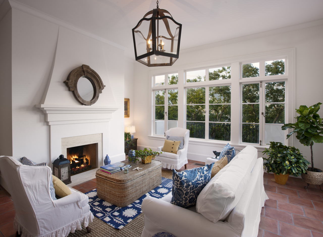 1041 Mission Ridge Road Santa Barbara, CA 93103 - Photo 3 of 11 a living room with furniture a fireplace and a floor to ceiling window