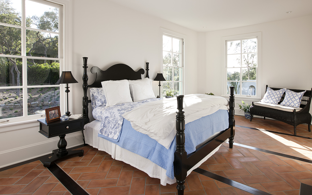 1041 Mission Ridge Road Santa Barbara, CA 93103 - Photo 6 of 11 a bedroom with a bed chair and window