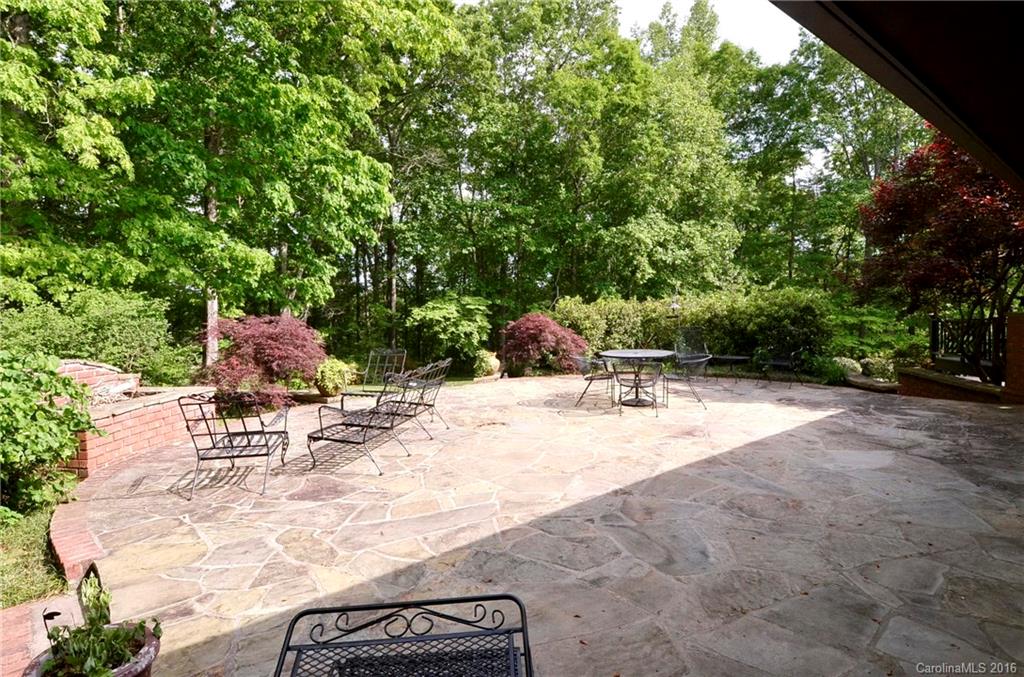 481 Pleasant Hill Road Rutherfordton, NC 28139 - Photo 5 of 15 a view of a backyard with sitting area