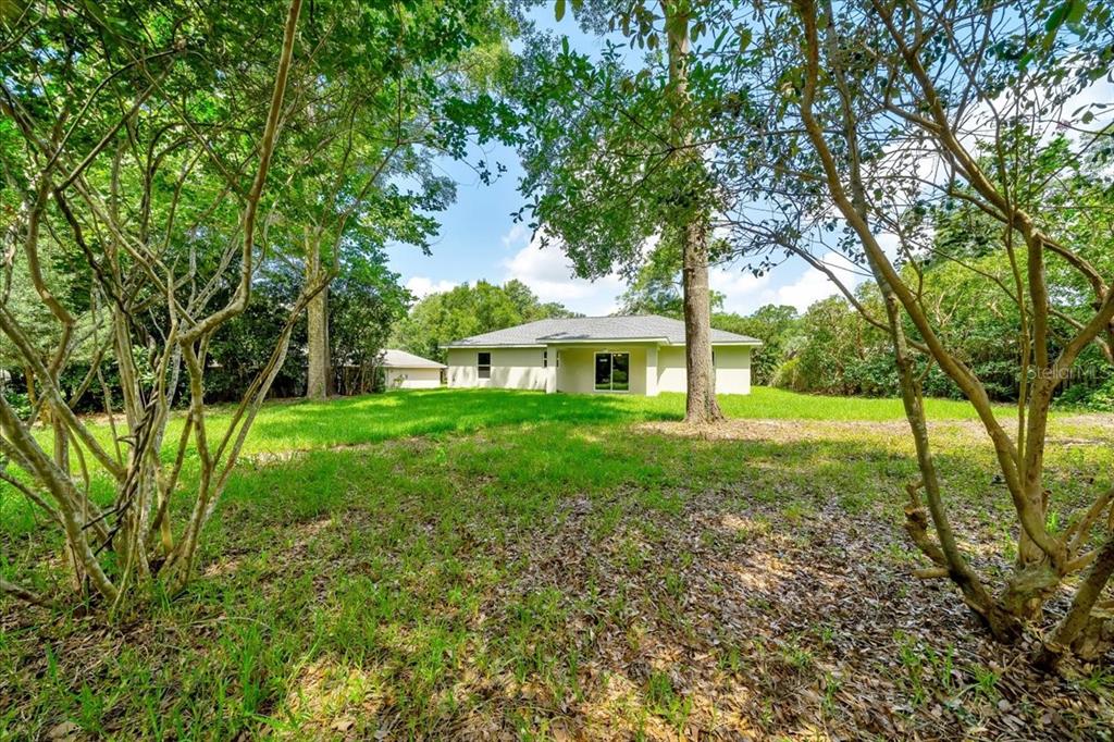 10675 Southwest 69th Terrace Ocala, FL 34476 - Photo 45 of 48 a view of house with backyard