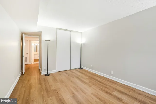 a view of an outdoor space with furniture and umbrella