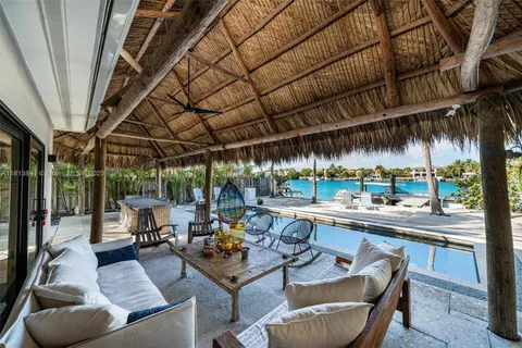 a view of swimming pool with chairs