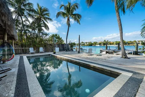 a view of a lake with sitting area