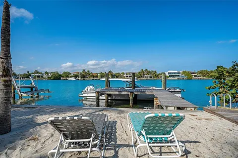 a view of outdoor sitting area with swimming pool