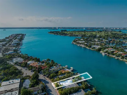 an aerial view of a house with a garden view