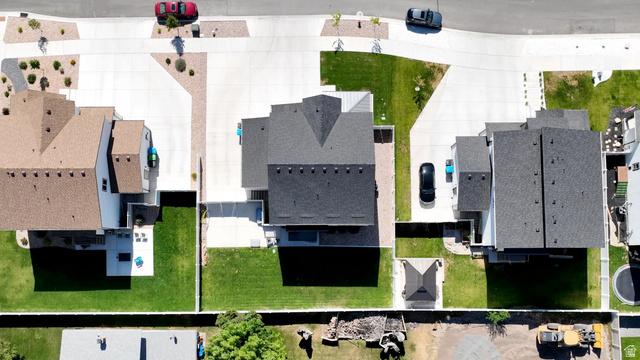 983 South 950 West Provo, UT 84601 - Photo 56 of 56 Aerial view showcasing a residential property with a dark shingle roof and a concrete driveway