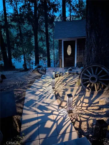 a view of an entrance to house and yard