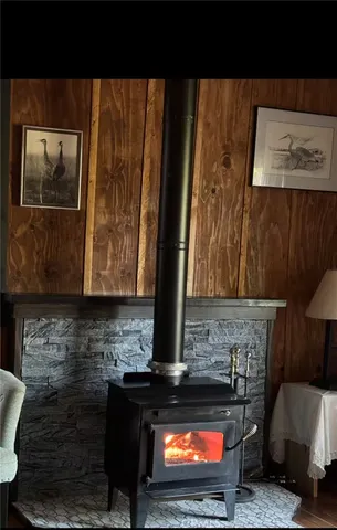 a fireplace with wooden floor