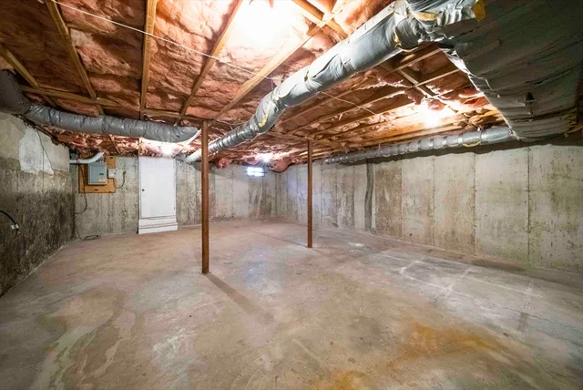 a view of a room with wooden walls