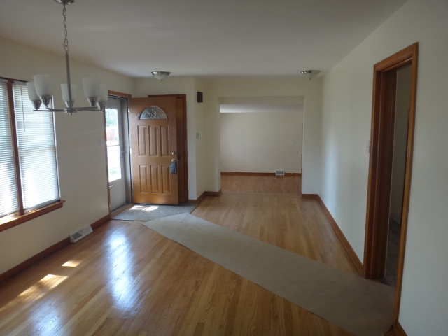 4044 Clinton Avenue Stickney, IL 60402 - Photo 2 of 11 a view of gallery with wooden floor