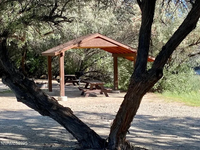a view of swimming pool with a patio