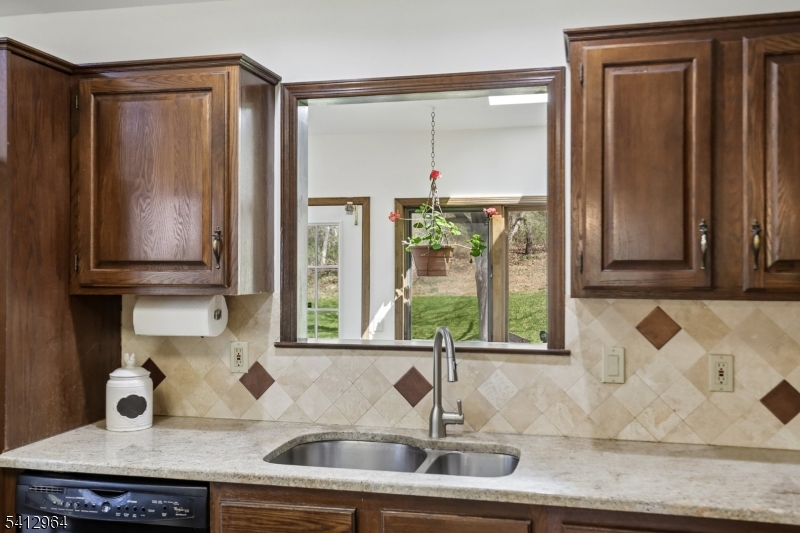 34 Knollcroft Road Bernards, NJ 07920 - Photo 11 of 34 a kitchen with a sink and a window