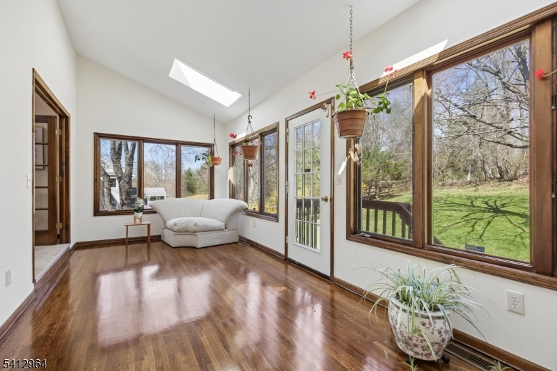 34 Knollcroft Road Bernards, NJ 07920 - Photo 14 of 34 a living room with large windows and furniture