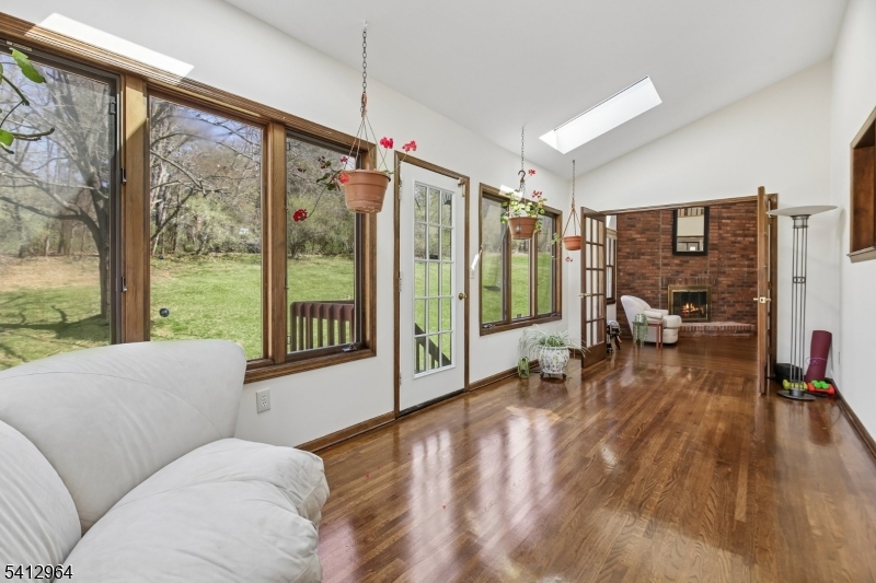 34 Knollcroft Road Bernards, NJ 07920 - Photo 15 of 34 a living room filled with furniture and a large window