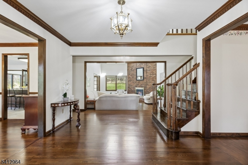 34 Knollcroft Road Bernards, NJ 07920 - Photo 3 of 34 a view of an entryway with wooden floor and windows
