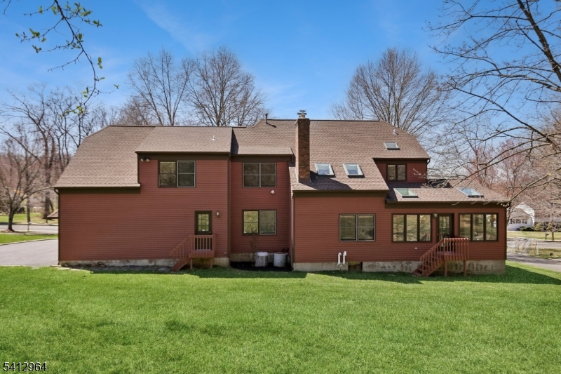 34 Knollcroft Road Bernards, NJ 07920 - Photo 33 of 34 front view of a house with a yard