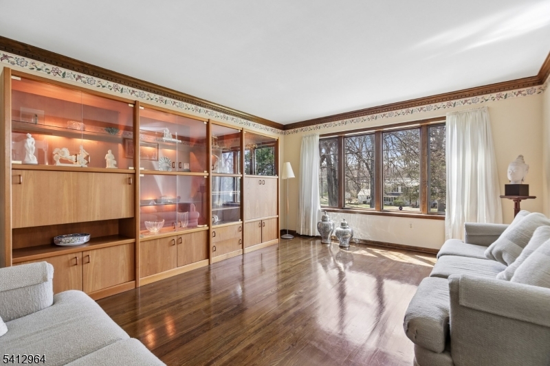 34 Knollcroft Road Bernards, NJ 07920 - Photo 4 of 34 a living room with furniture and a large window