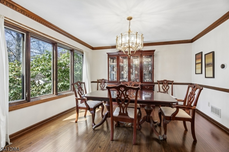 34 Knollcroft Road Bernards, NJ 07920 - Photo 5 of 34 a view of a dining room with furniture window and wooden floor