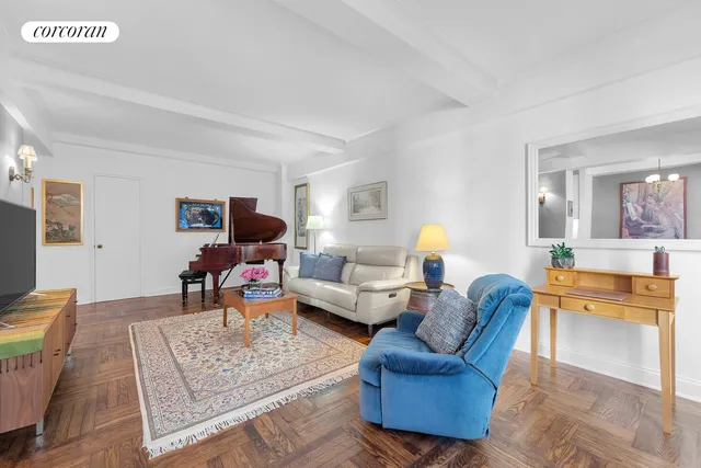 a kitchen with a refrigerator and a sink