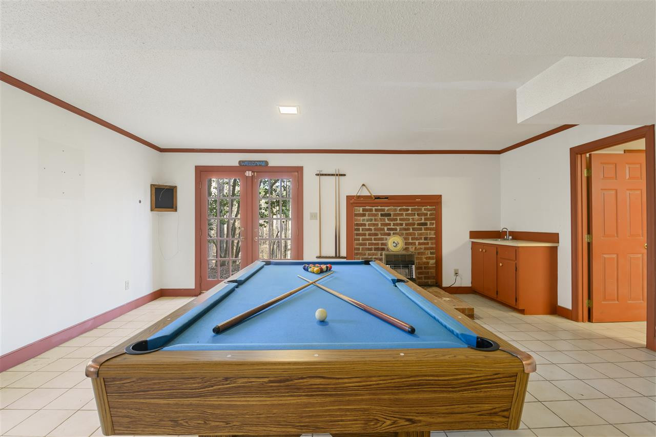 8528 Bournemouth Drive Raleigh, NC 27615 - Photo 26 of 30 Finished Basement