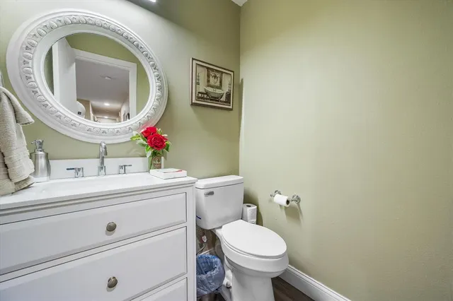 a bathroom with a toilet and a sink